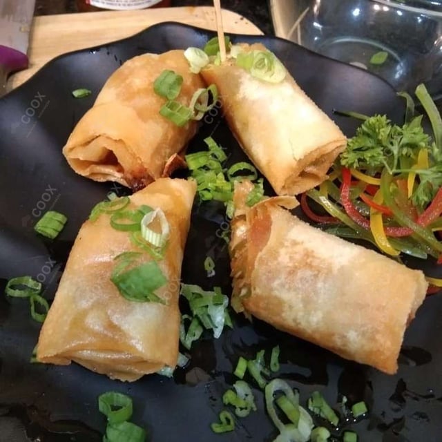 Delicious Veg Spring Rolls prepared by COOX