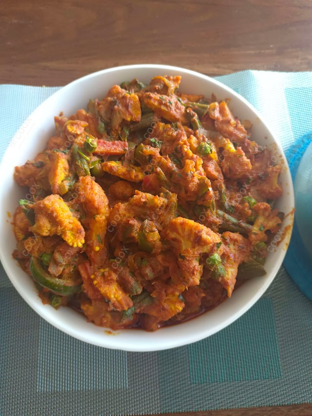 Delicious Jeera Aloo prepared by COOX