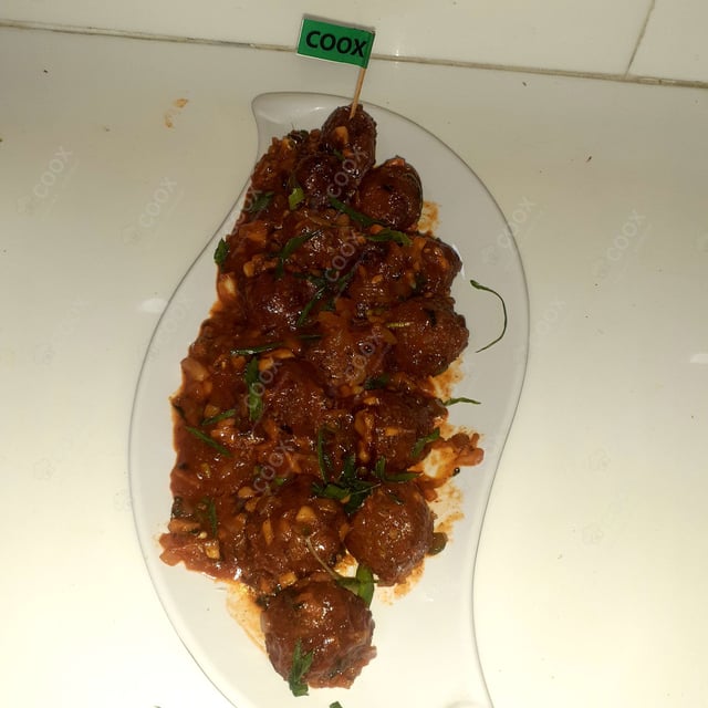 Delicious Veg Manchurian (Dry) prepared by COOX