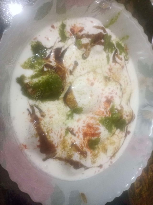 Delicious Dahi Bhalla prepared by COOX