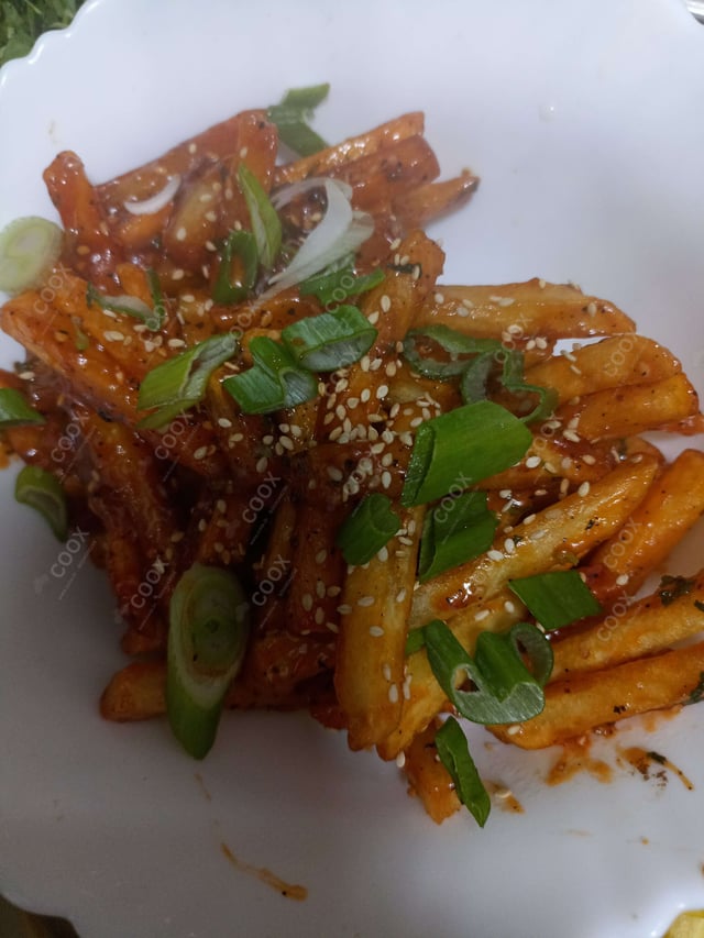 Delicious Honey Chilli Potato prepared by COOX