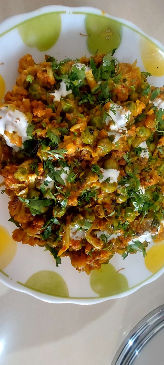 Delicious Gobhi Matar prepared by COOX