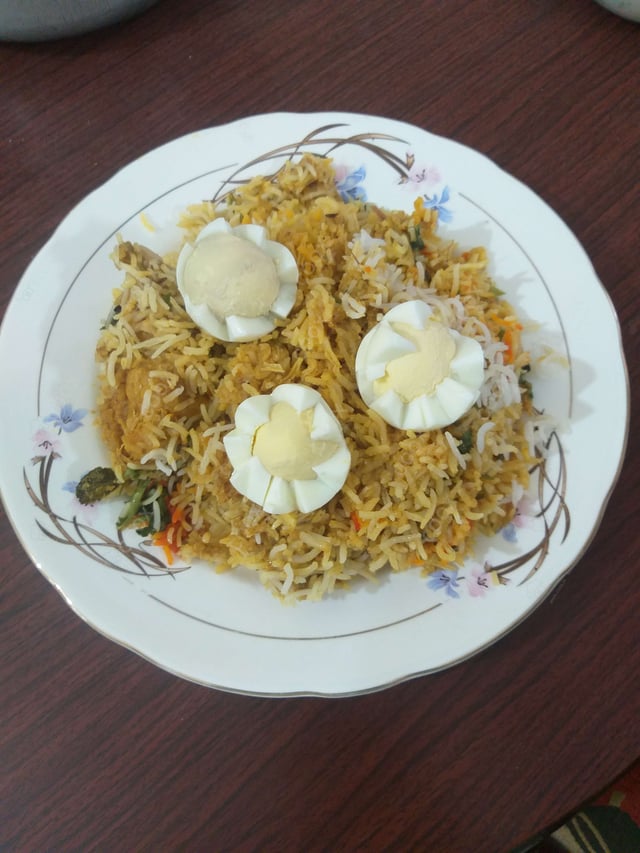 Delicious Chicken Biryani prepared by COOX