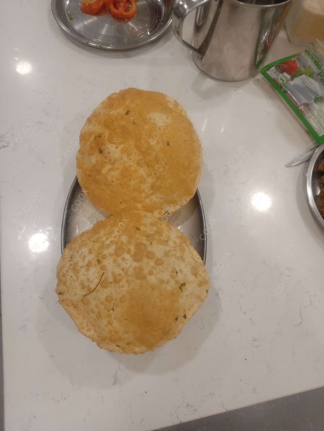 Delicious Bhature prepared by COOX