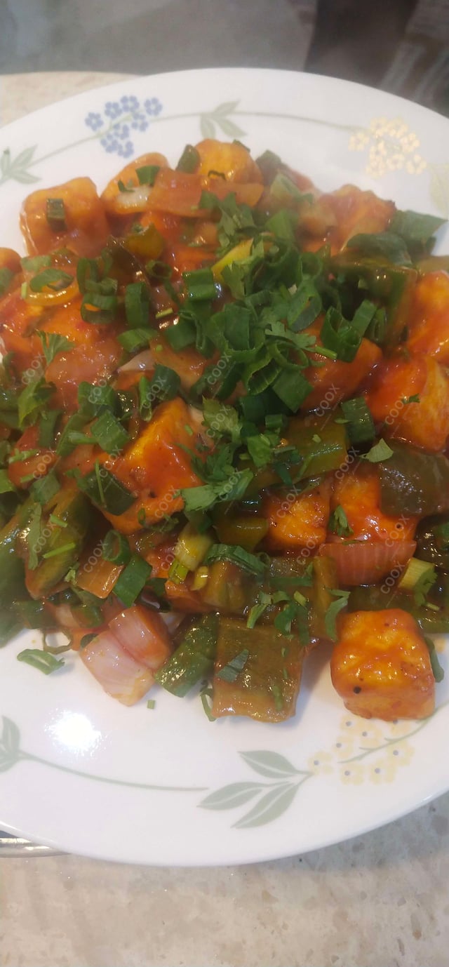 Delicious Chilli Paneer (Dry) prepared by COOX