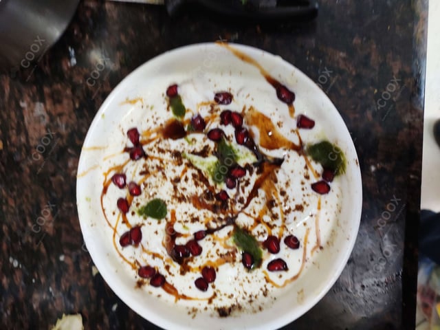 Delicious Dahi Bhalla prepared by COOX