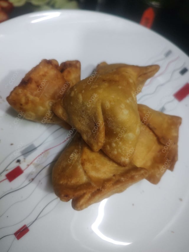 Delicious Mini Samosas prepared by COOX