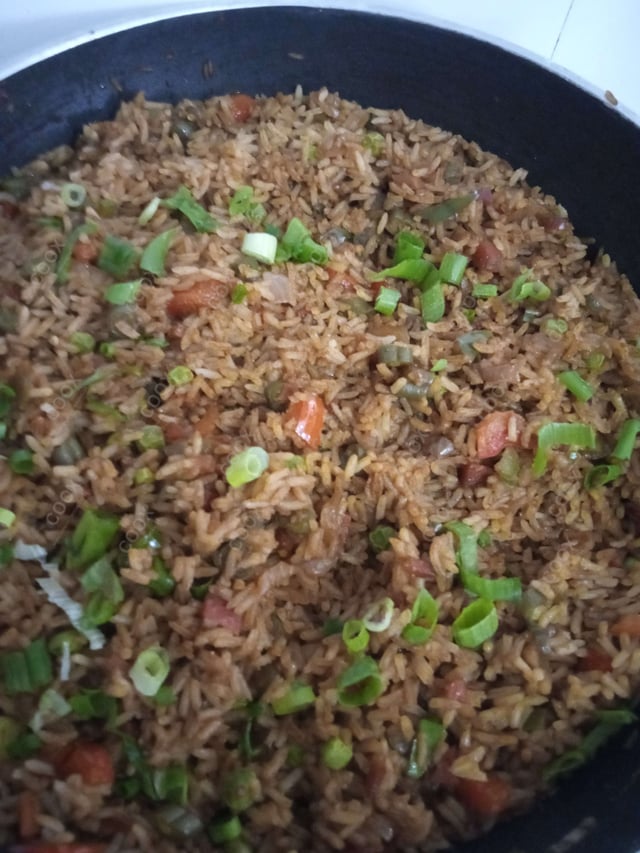 Delicious Schezwan Fried Rice prepared by COOX