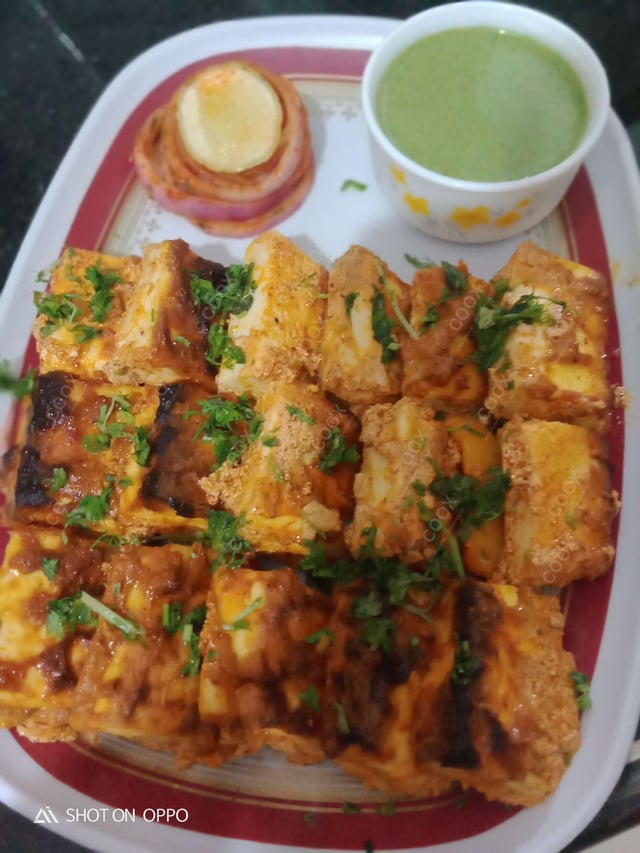 Delicious Paneer Tikka prepared by COOX