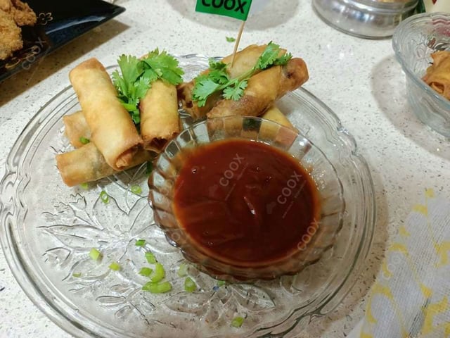 Delicious Veg Spring Rolls prepared by COOX