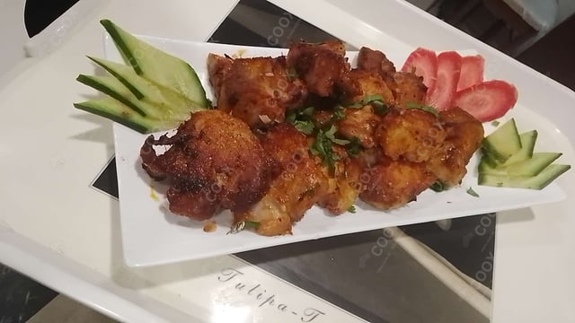 Delicious Fish Tikka prepared by COOX