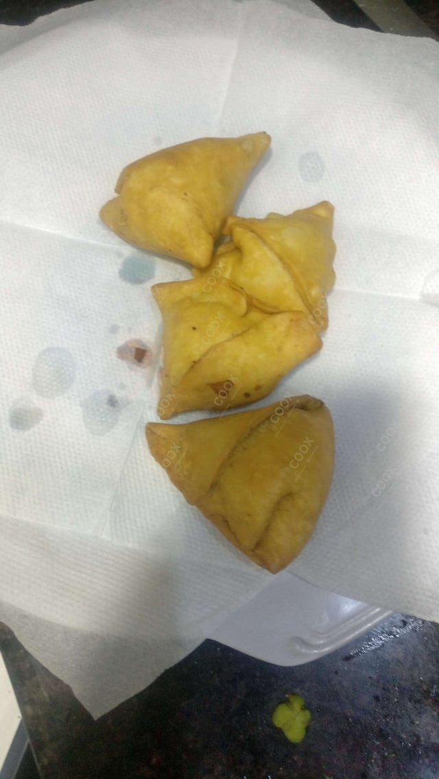 Delicious Mini Samosas prepared by COOX