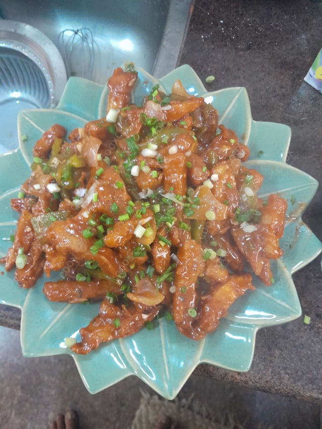 Delicious Honey Chilli Potato prepared by COOX