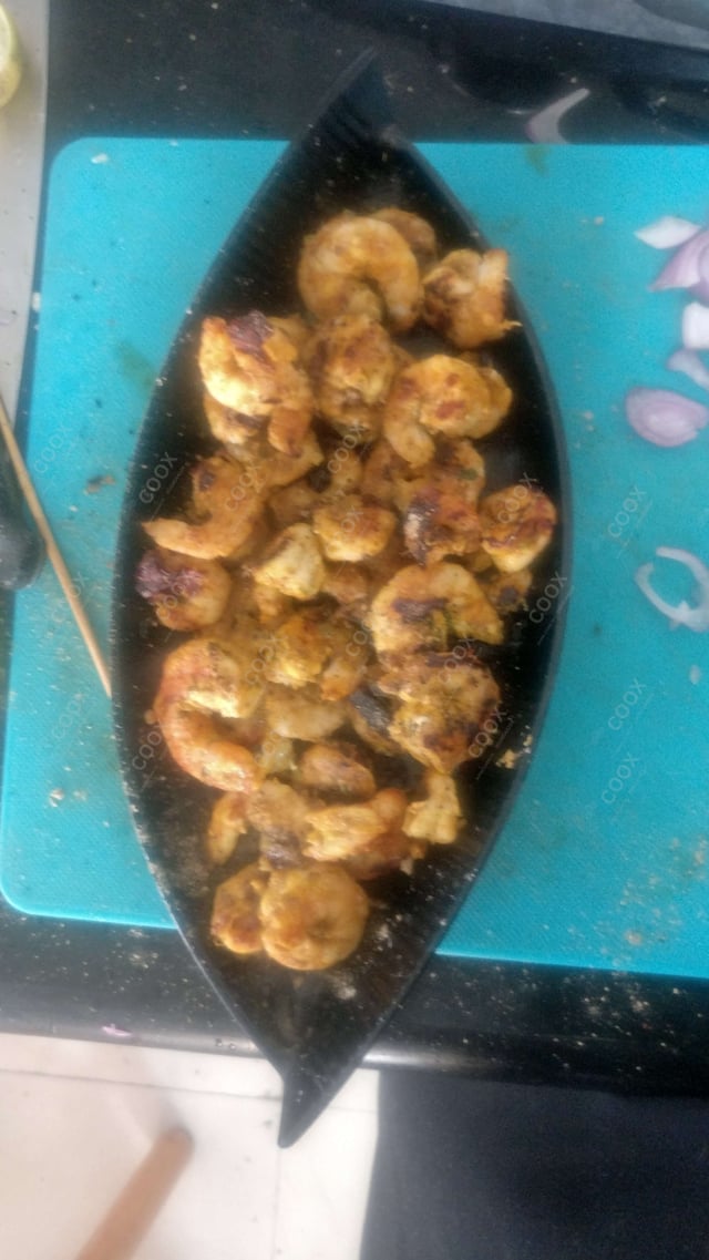 Delicious Tandoori Prawns prepared by COOX