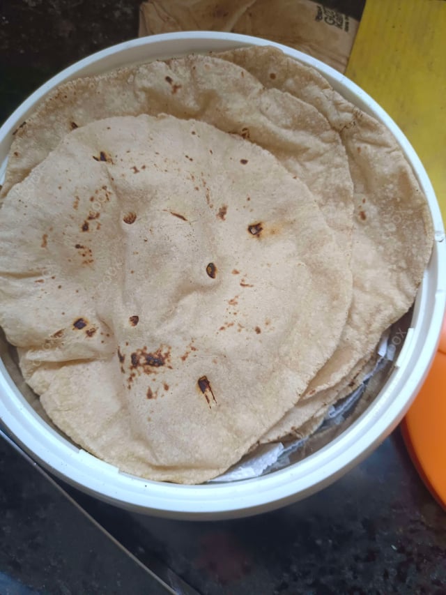 Delicious Tawa Rotis prepared by COOX