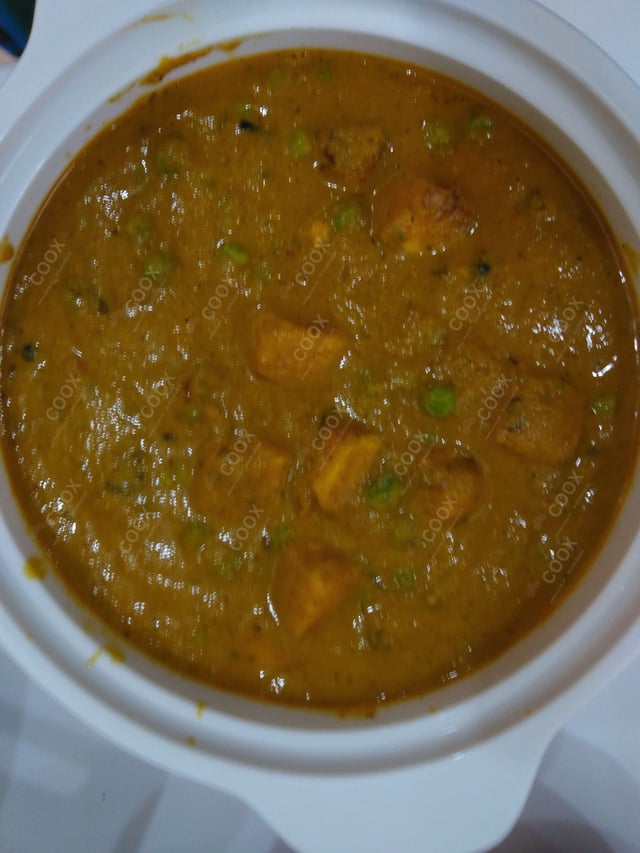 Delicious Matar Paneer prepared by COOX