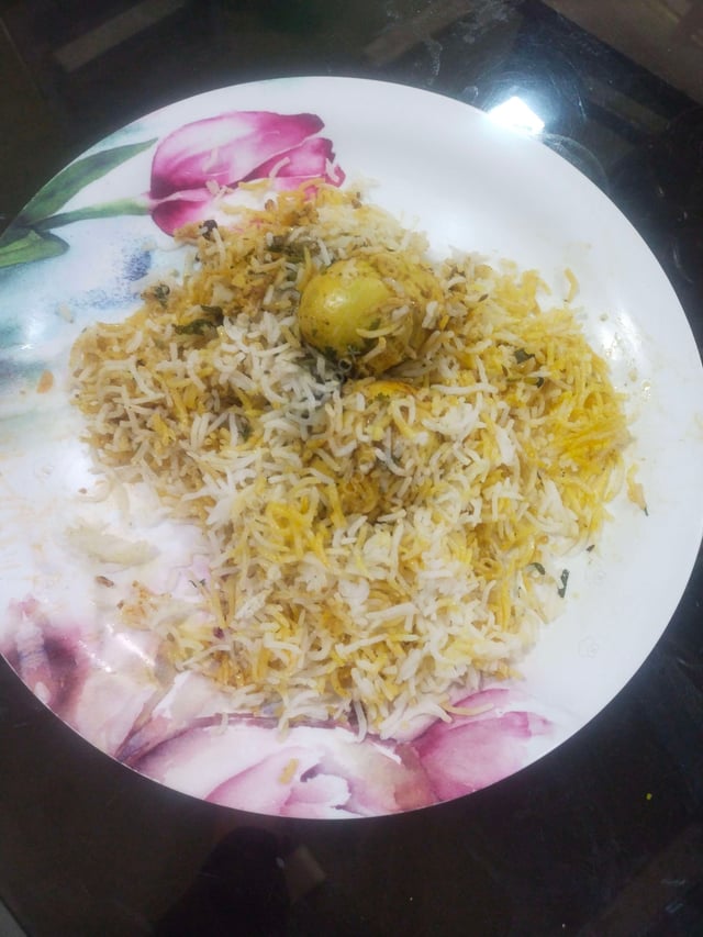 Delicious Egg Biryani prepared by COOX