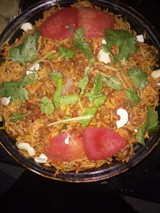 Delicious Chicken Biryani prepared by COOX