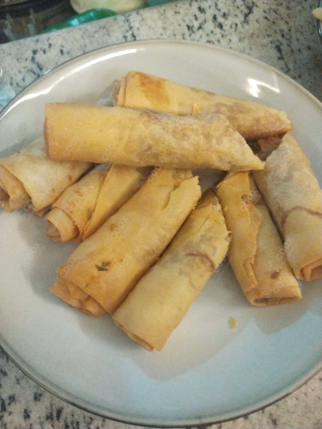 Delicious Veg Spring Rolls prepared by COOX