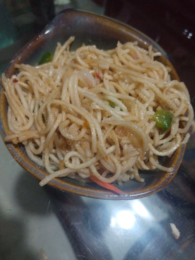 Delicious Veg Hakka Noodles prepared by COOX