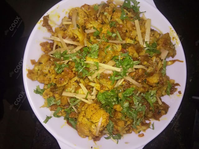 Delicious Adraki Gobhi prepared by COOX