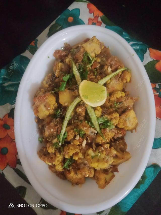 Delicious Adraki Gobhi prepared by COOX