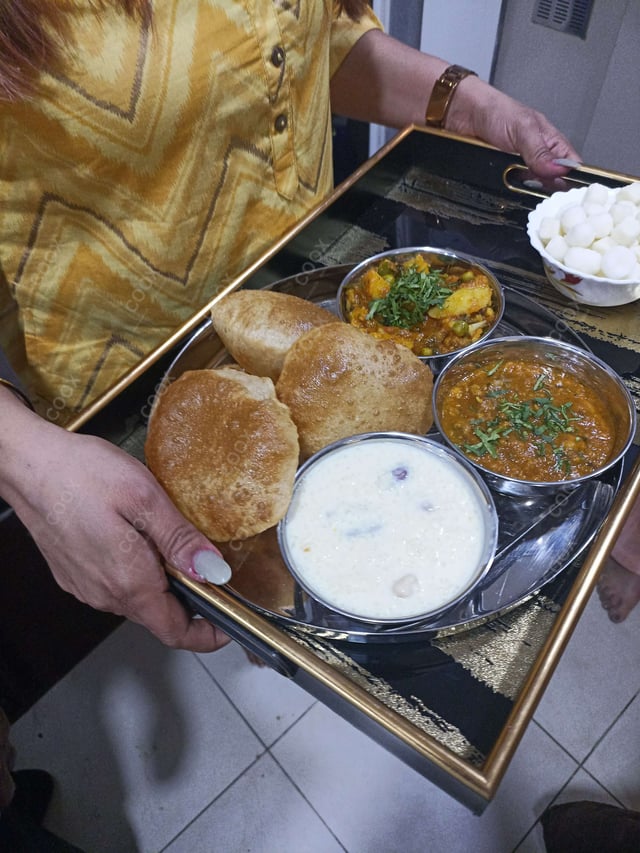 Delicious Pooris & Bedmis prepared by COOX