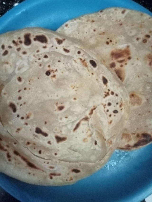 Delicious Lachha Parathas prepared by COOX