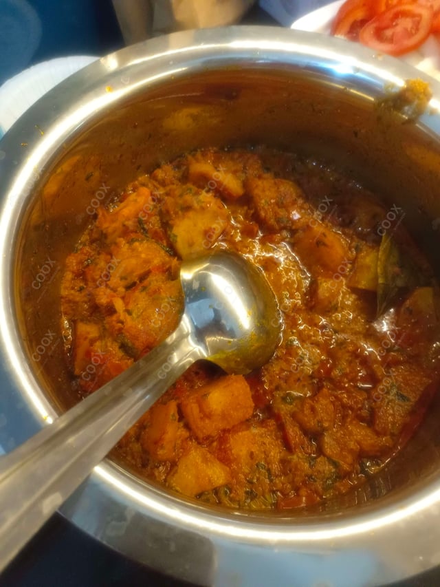 Delicious Dum Aloo prepared by COOX