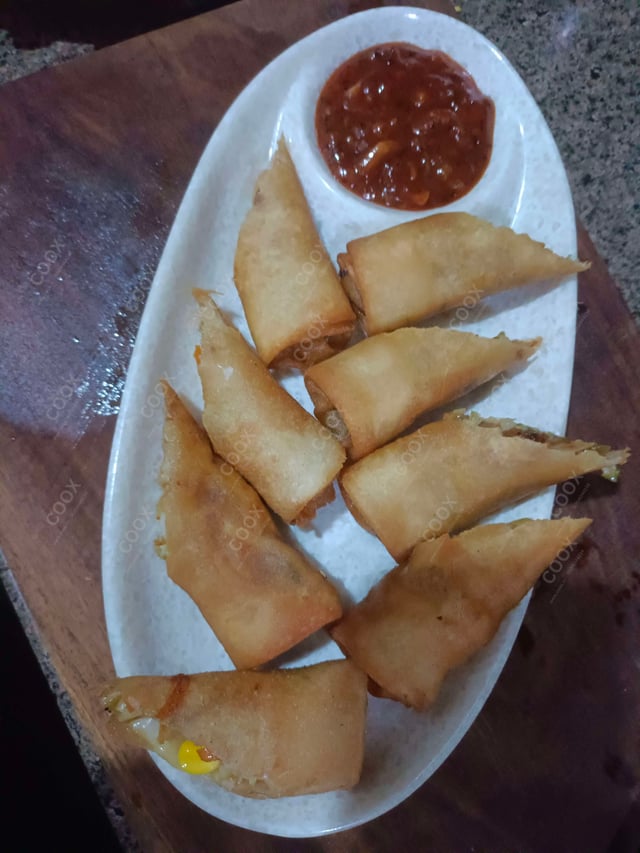 Delicious Veg Spring Rolls prepared by COOX