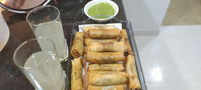 Delicious Veg Spring Rolls prepared by COOX