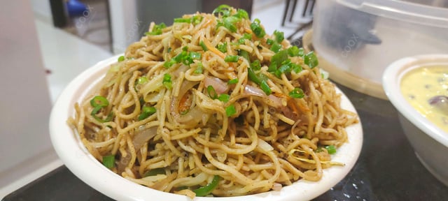 Delicious Veg Hakka Noodles prepared by COOX