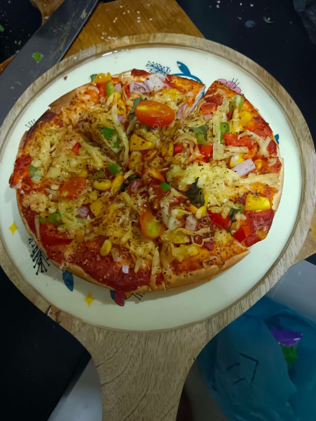 Delicious Veg Pizza prepared by COOX