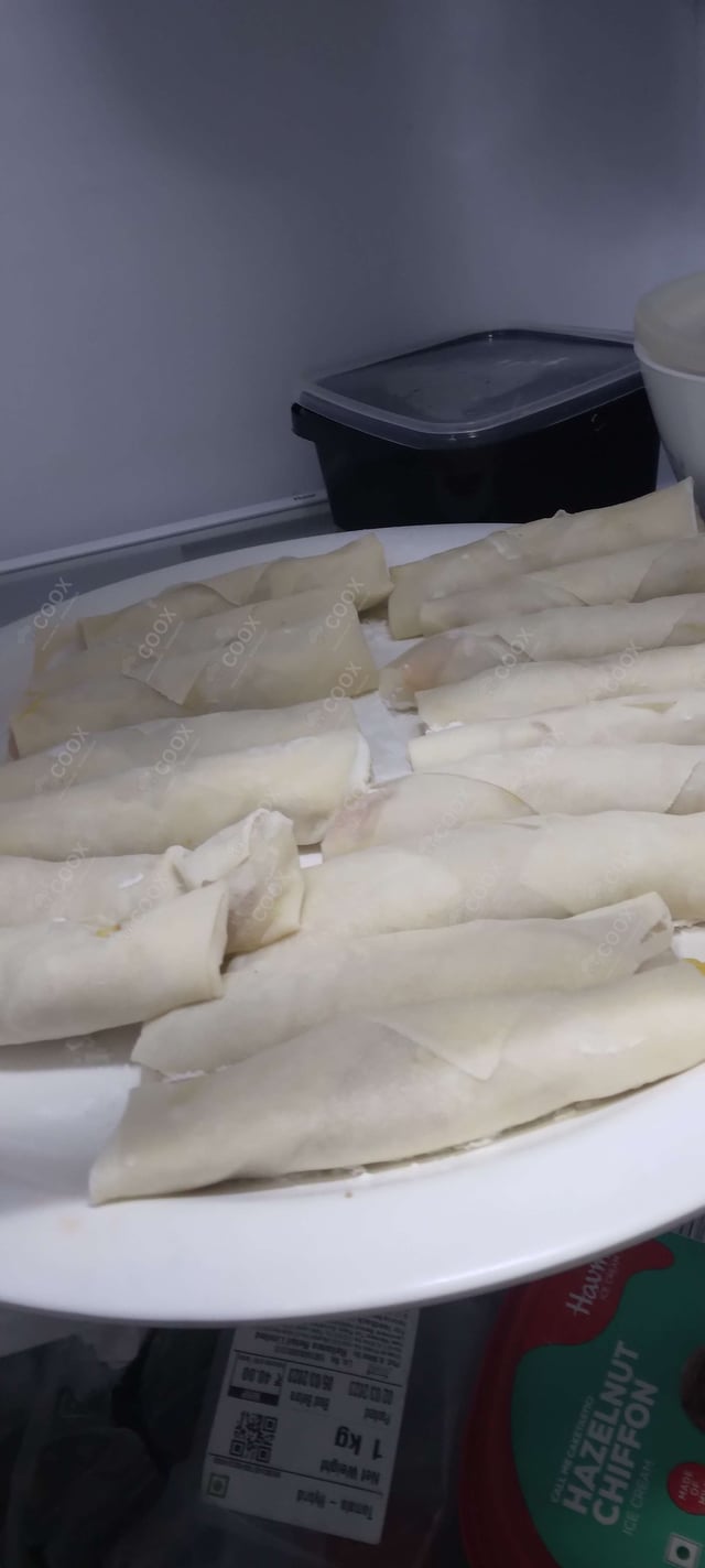 Delicious Chicken Spring Rolls prepared by COOX