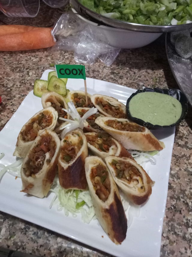 Delicious Veg Spring Rolls prepared by COOX