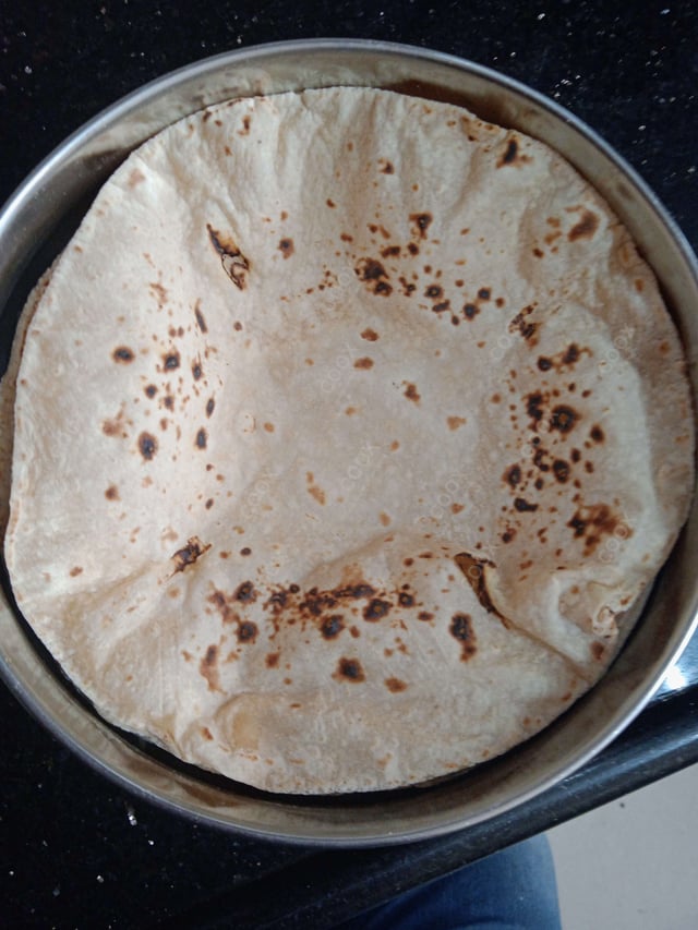 Delicious Tawa Rotis prepared by COOX