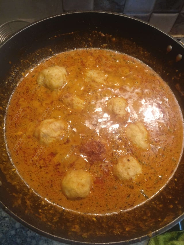 Delicious Dum Aloo prepared by COOX