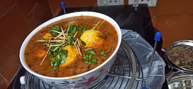 Delicious Egg Curry prepared by COOX