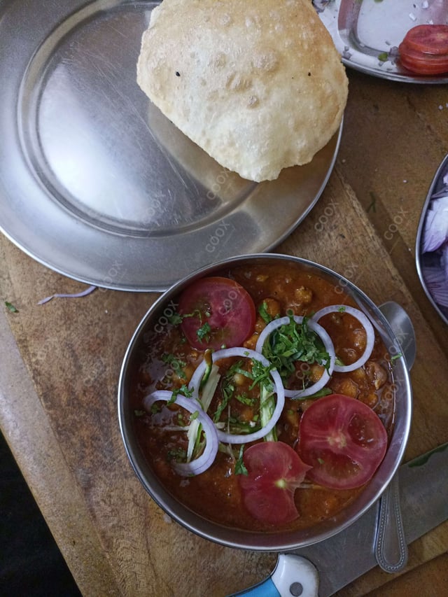 Delicious Chana Bhatura prepared by COOX