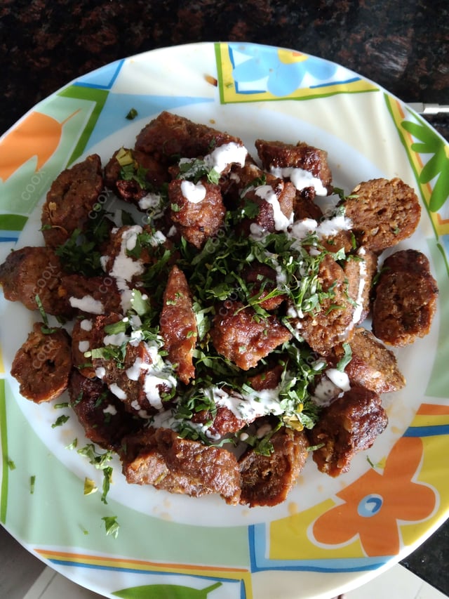 Delicious Mutton Seekh Kebab prepared by COOX