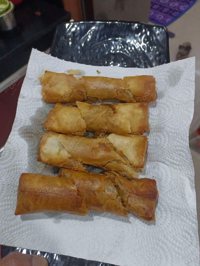 Delicious Veg Spring Rolls prepared by COOX