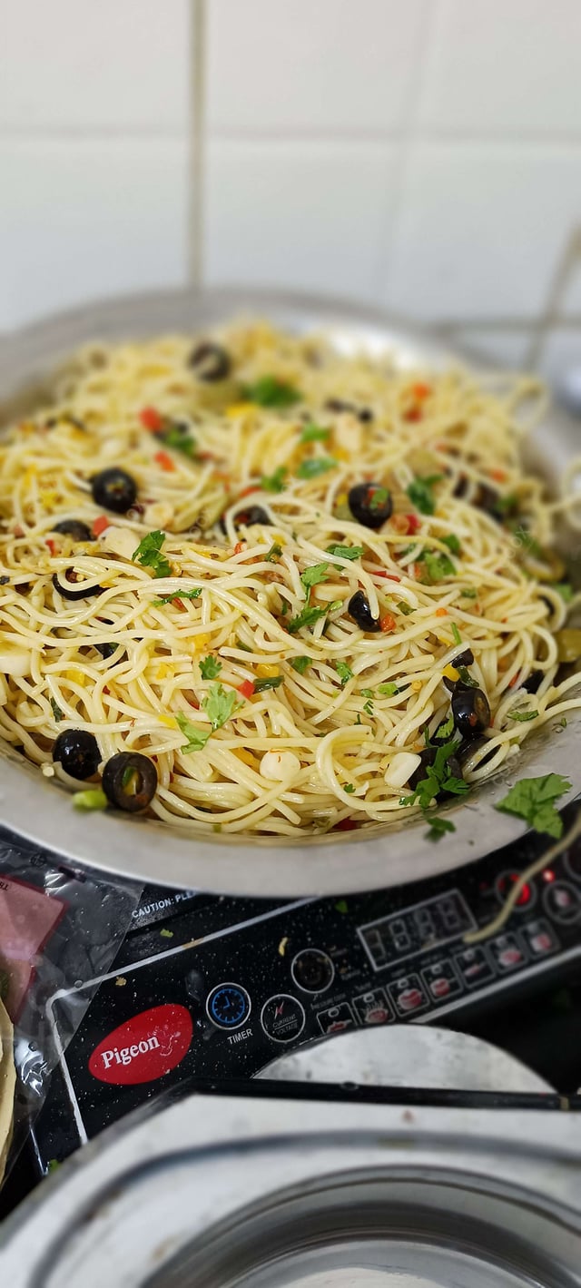 Delicious Spaghetti Aglio e Olio prepared by COOX