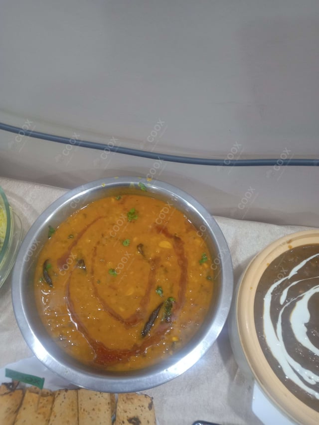 Delicious Dal Tadka prepared by COOX