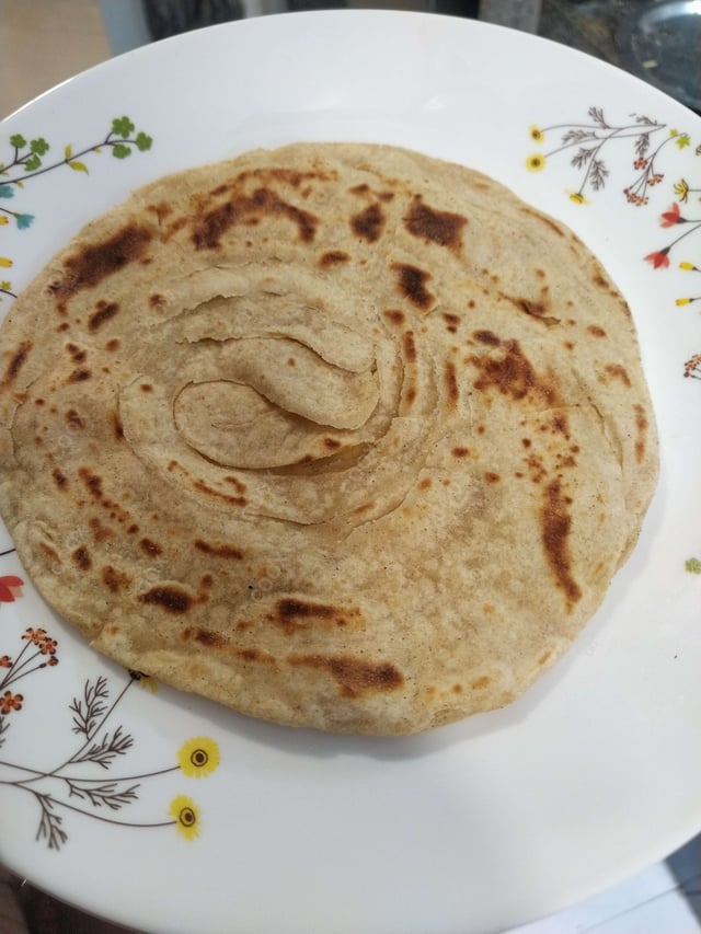 Delicious Lachha Parathas prepared by COOX