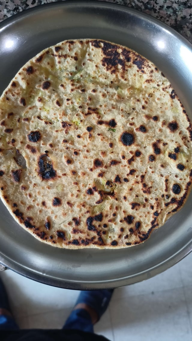 Delicious Stuffed Paranthas prepared by COOX