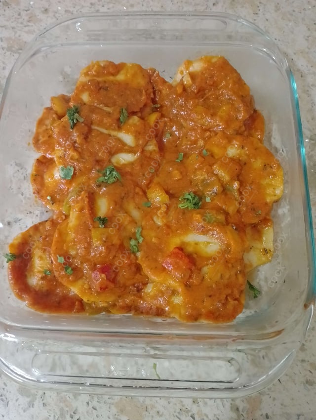 Delicious Ravioli in Pink Sauce prepared by COOX