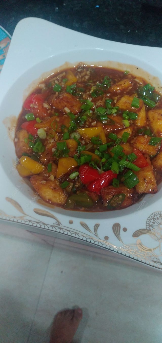 Delicious Chilly Paneer (Gravy) prepared by COOX