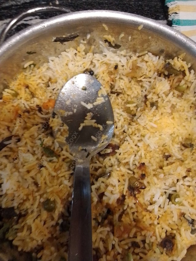 Delicious Veg Biryani prepared by COOX