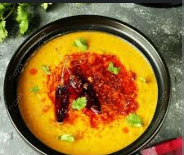 Delicious Dal Tadka prepared by COOX