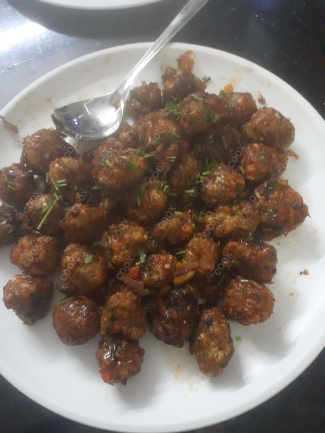 Delicious Veg Manchurian (Dry) prepared by COOX